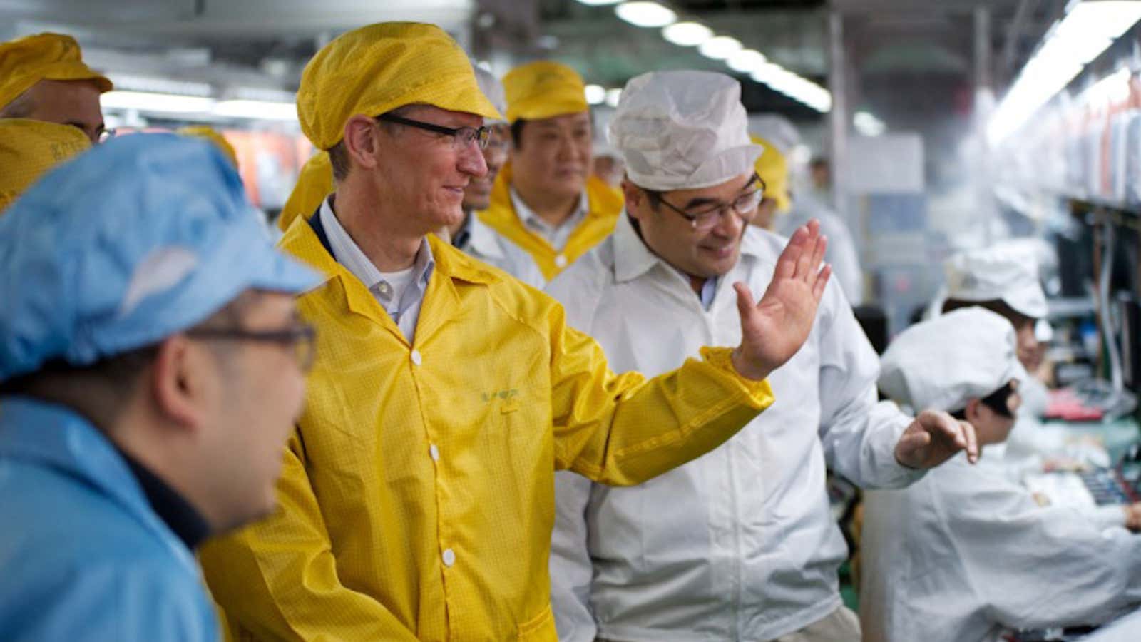 Apple CEO Tim Cook inspects Foxconn for cleanliness.