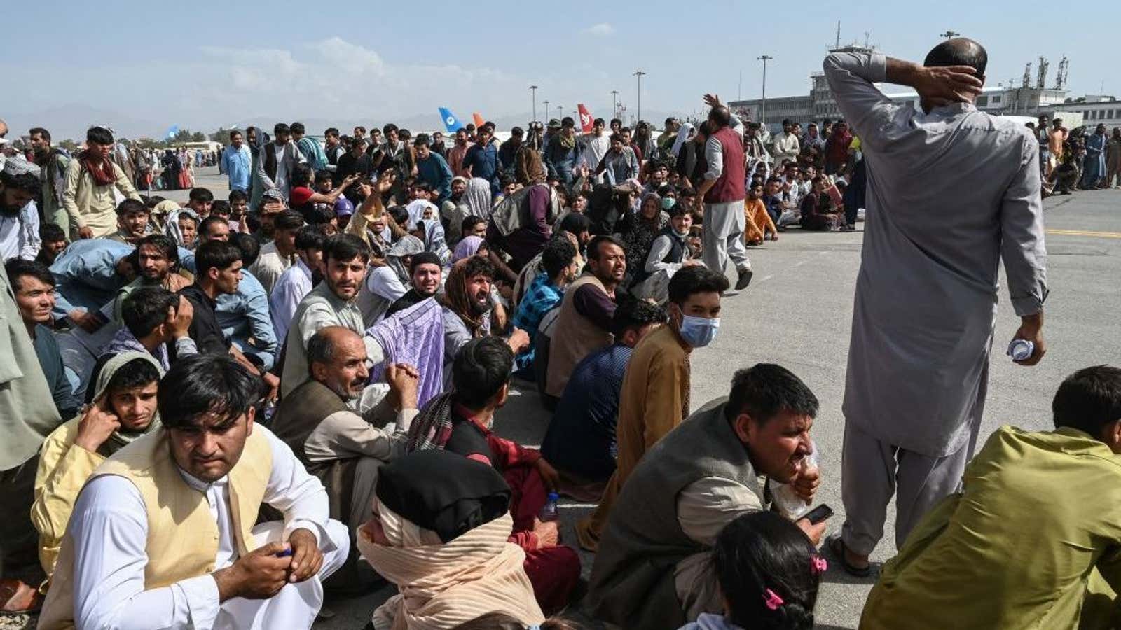 Crowds gathered at Kabul airport on Monday.