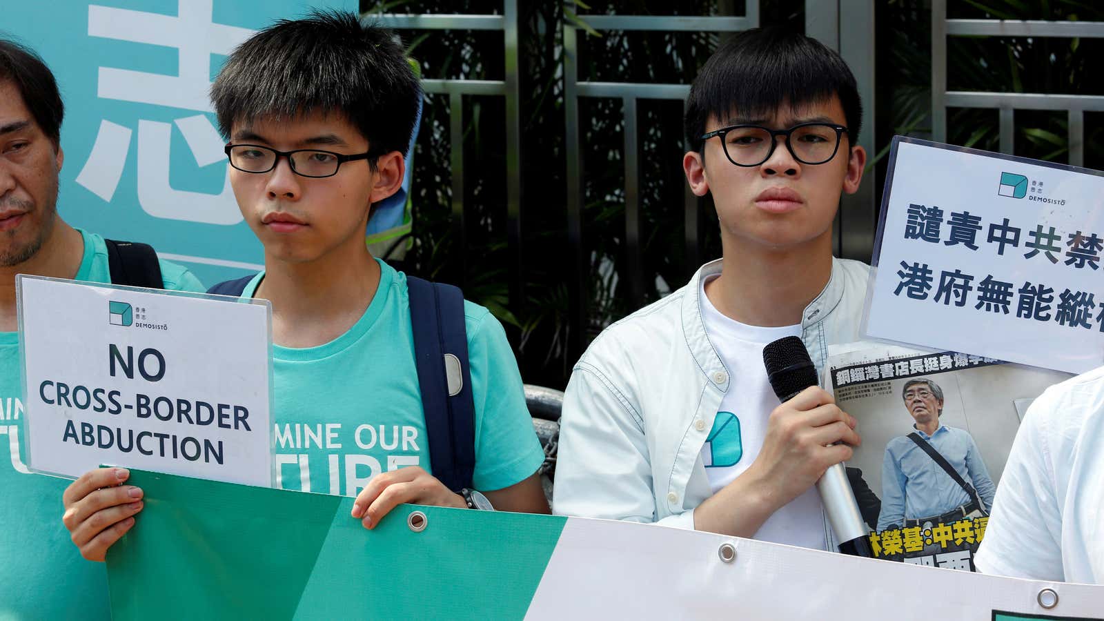 Joshua Wong, left, at a demonstration in solidarity for abducted bookseller Lam Wing-kee