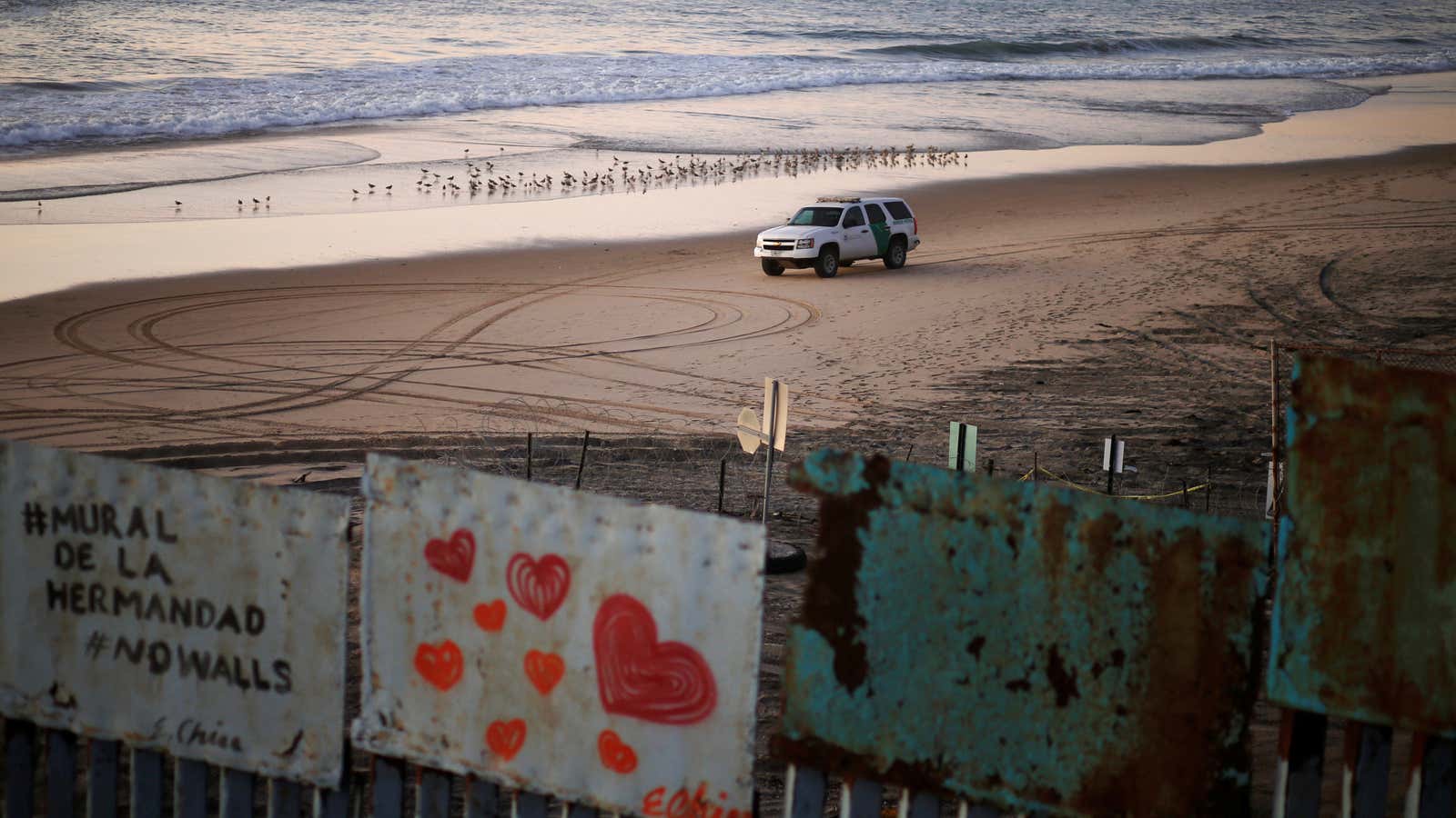 The US photographed through the wall  from Tijuana, Mexico.