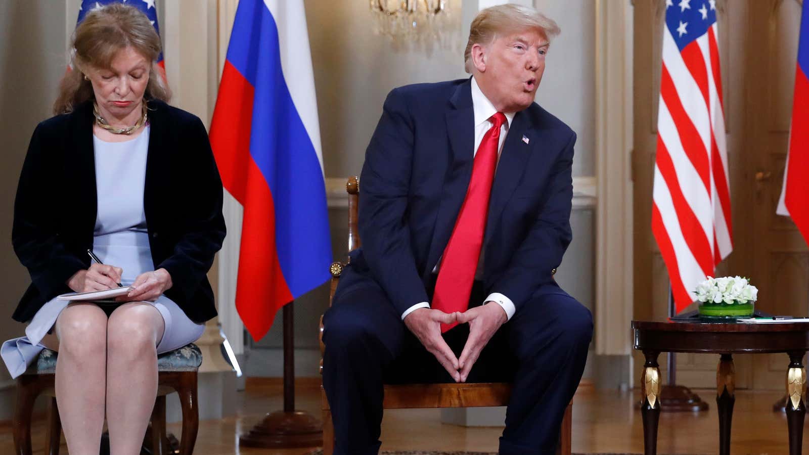 Marina Gross, left, takes notes when Trump talks to Putin in Helsinki.