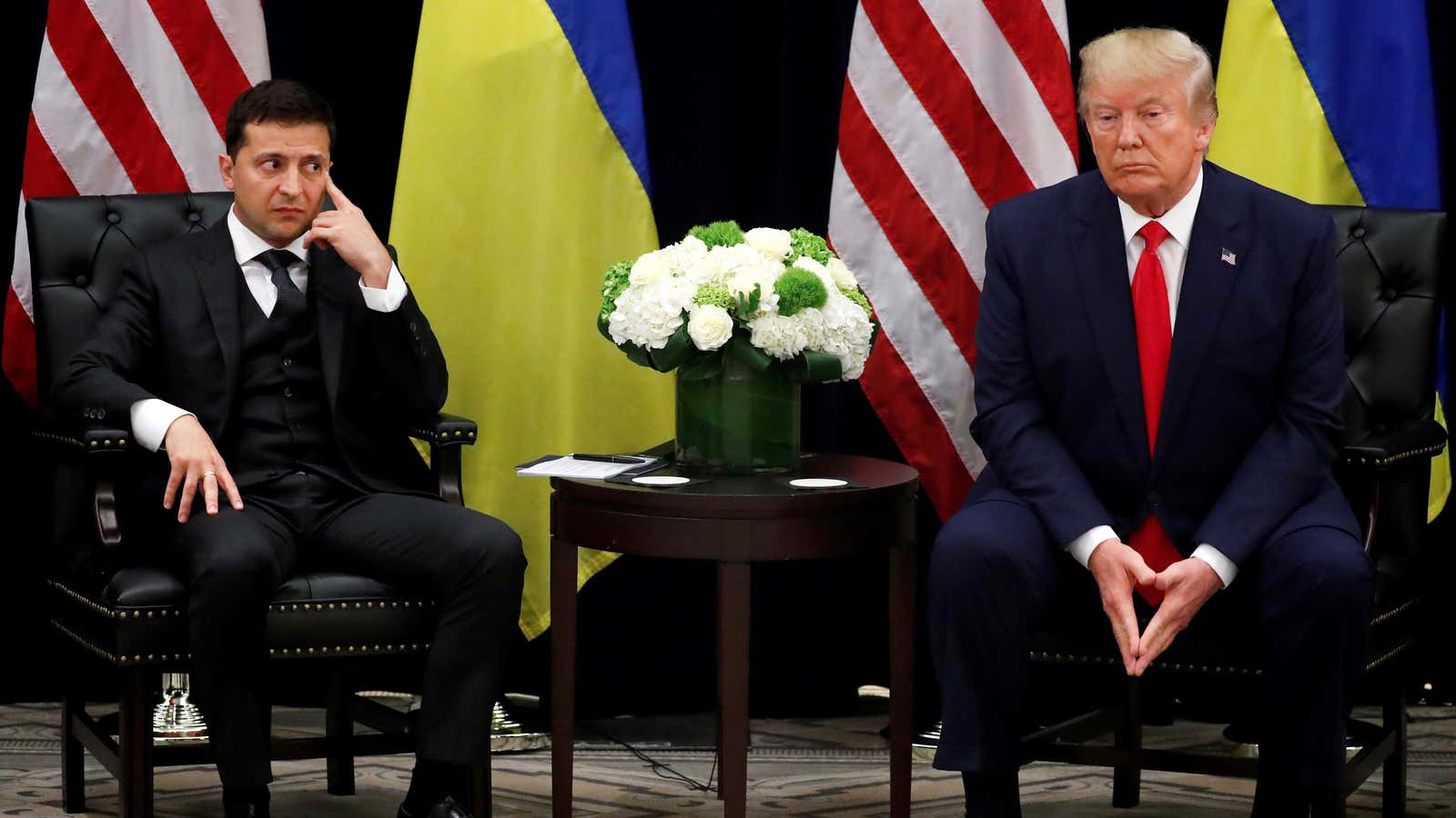 Zelensky and Trump looking glum.