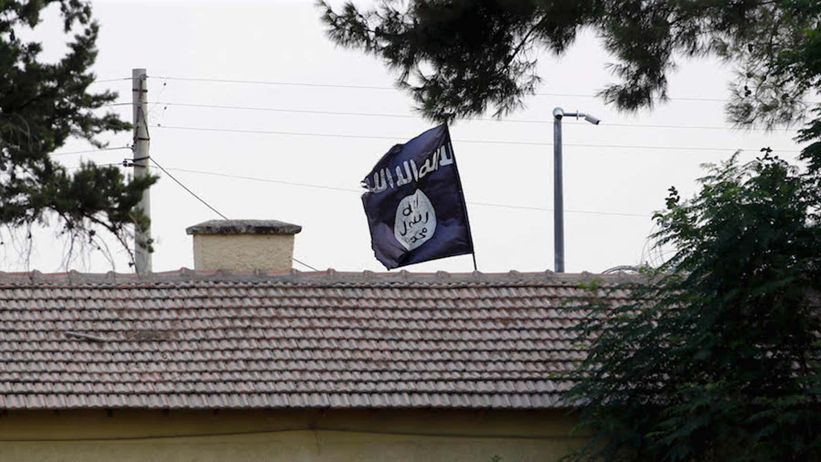 An ISIL flag flies just across the border from the Turkish town of Karkamis, in Gaziantep province.