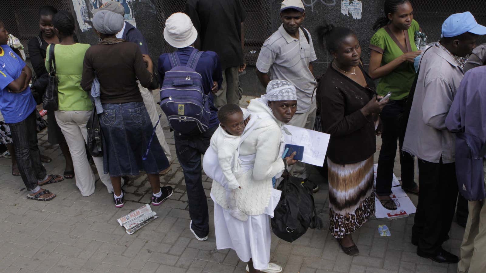 Zimbabweans queue outside immigration offices in downtown Johannesburg.