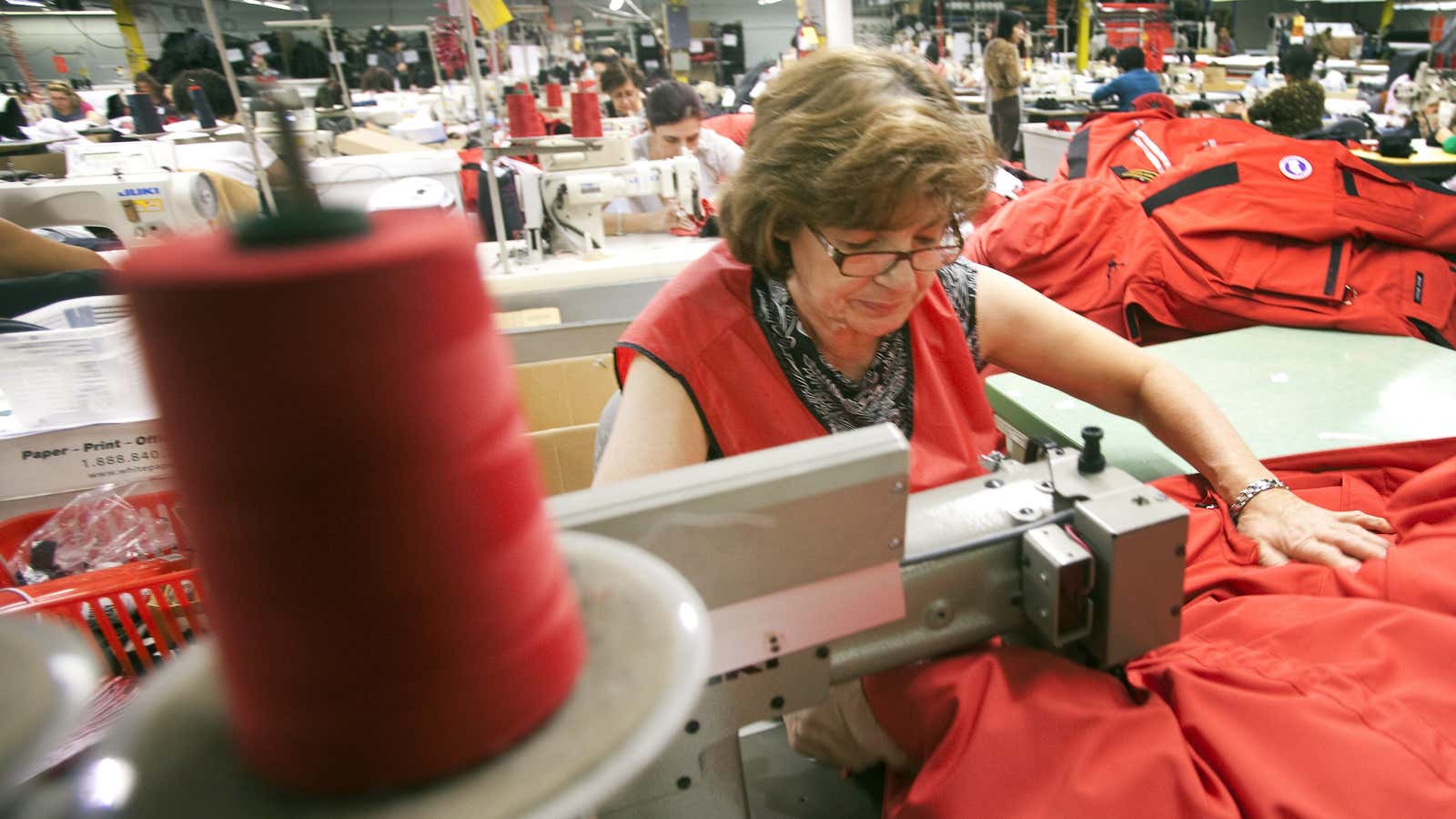 There are lots of women sewing the jackets, thats for sure.