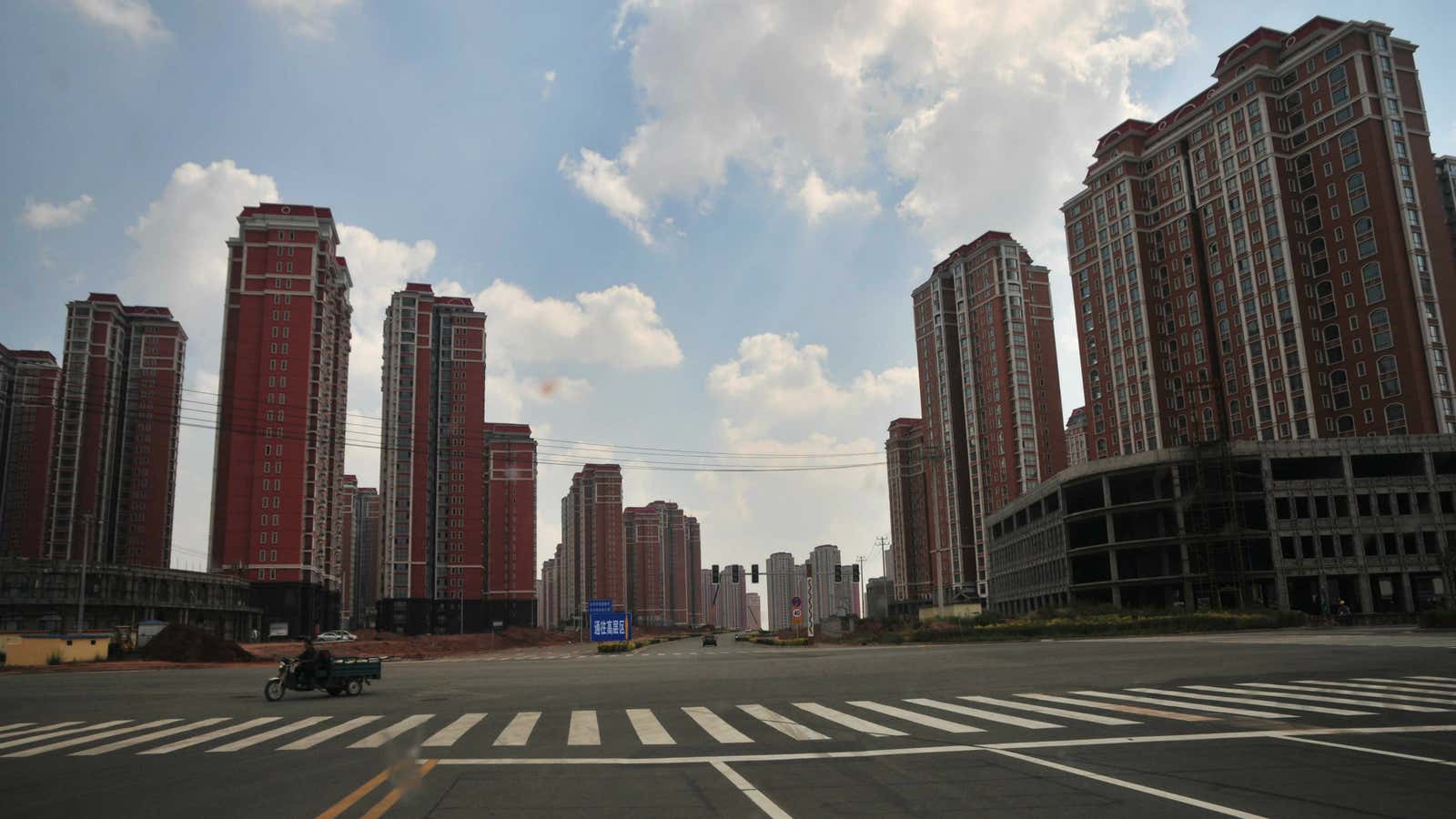 A cyclist gets some “me” time in the empty city of Ordos.