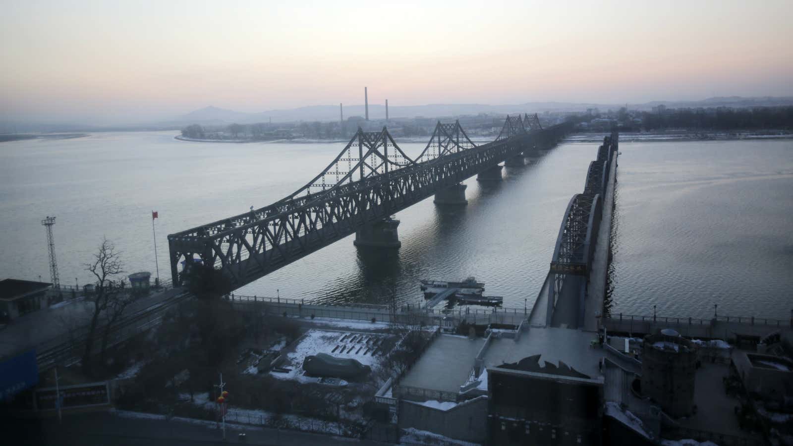 The Friendship Bridge and Yalu River Bridge link Dandong, China, with the North Korean town of Sinuiju.