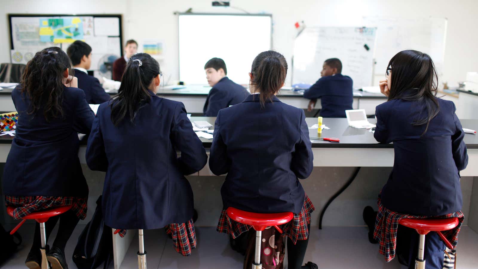 Students attend a class at the Oxford International College in Changzhou, Jiangsu province January 10, 2013. The website for a private school in Changzhou, one…