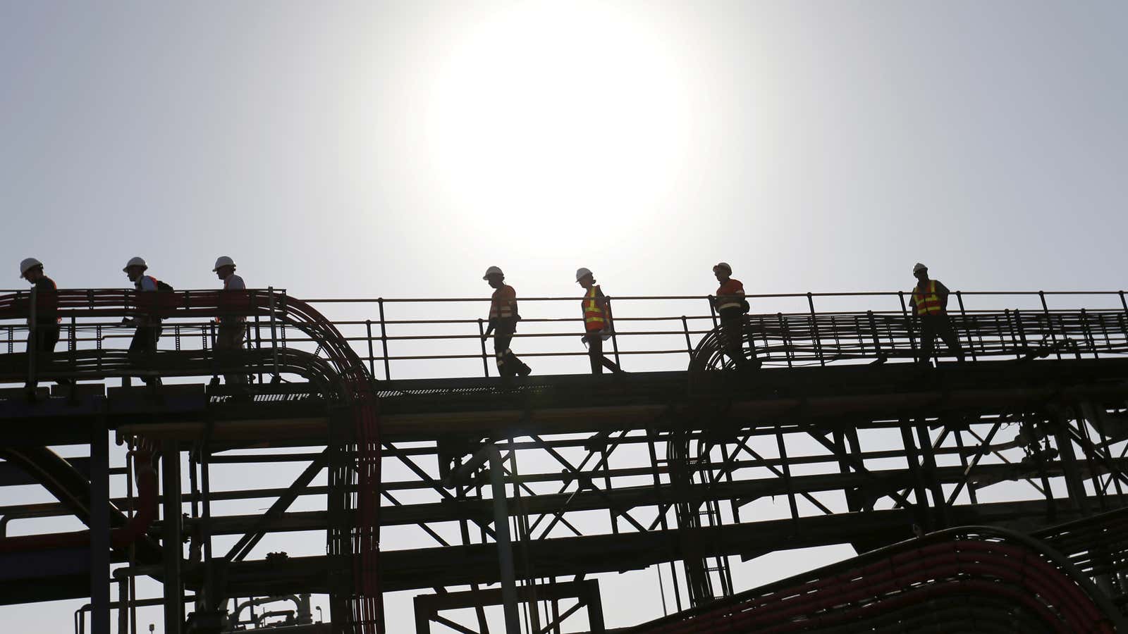 Workers and visitors at the Bisha Mining Share Company