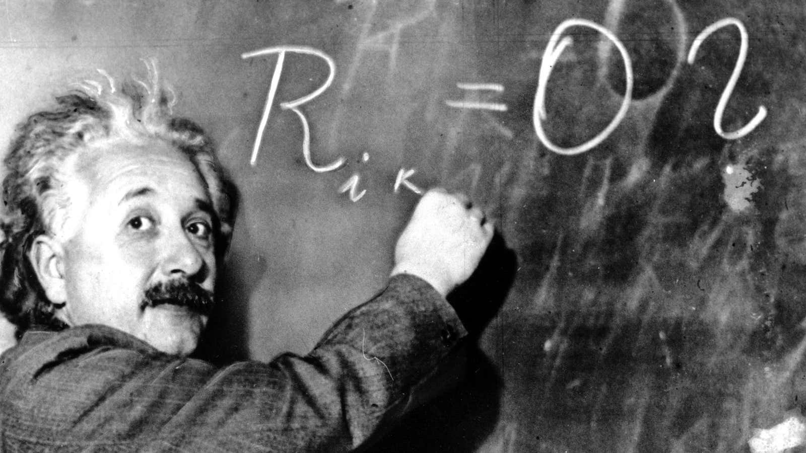 Prof. Albert Einstein uses the blackboard as he delivers the 11th Josiah Willard Gibbs lecture at the meeting of the American Association for the Advancement…