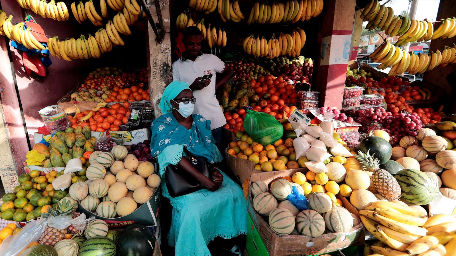 A woman wears a protective face mask, due to the global coronavirus disease outbreak in Dakar, Senegal