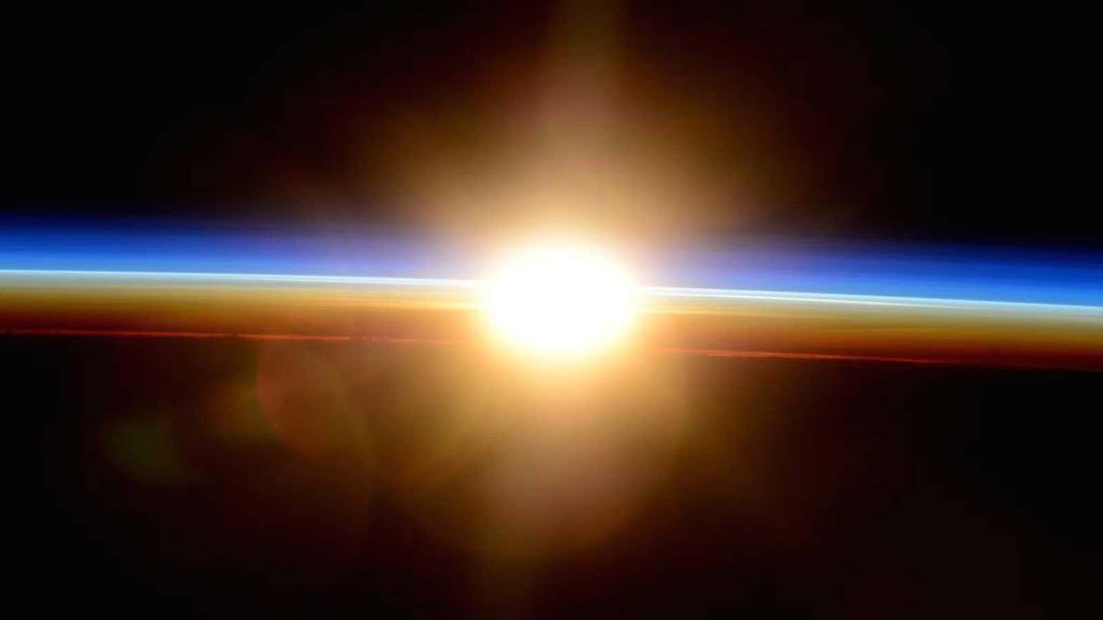 The sun passes the horizon from the ISS.