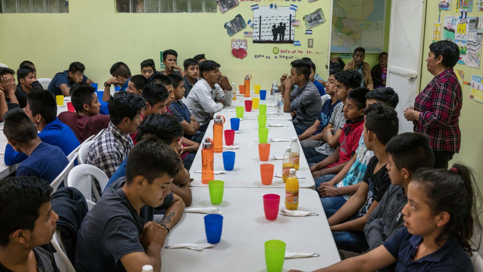 Children recently deported from Mexico eat at a shelter in Guatemala.