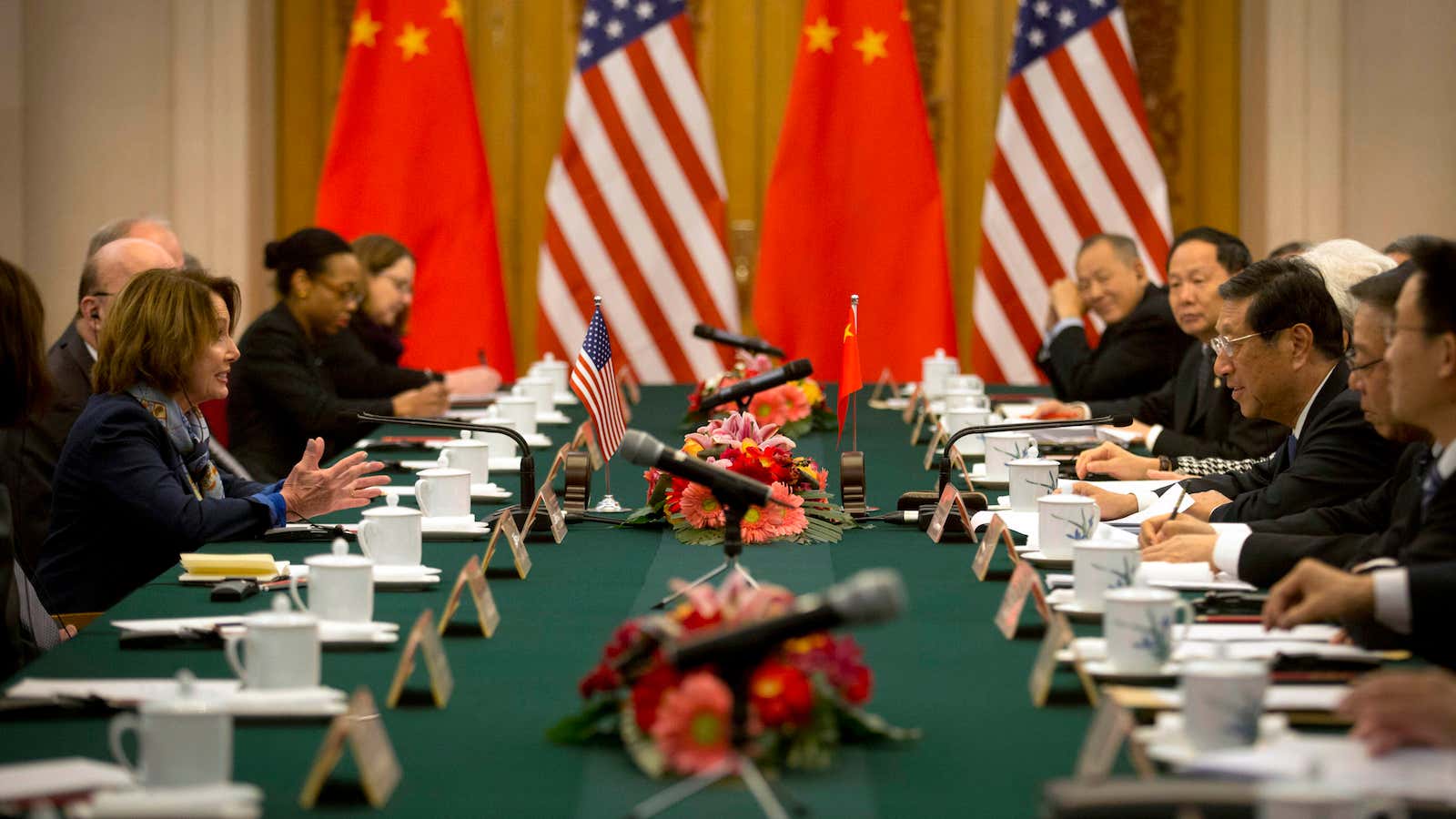 U.S. House Minority Leader Nancy Pelosi of Calif., left, speaks at a bilateral meeting with Zhang Ping, Vice Chairman of China’s National People’s Congress, right,…