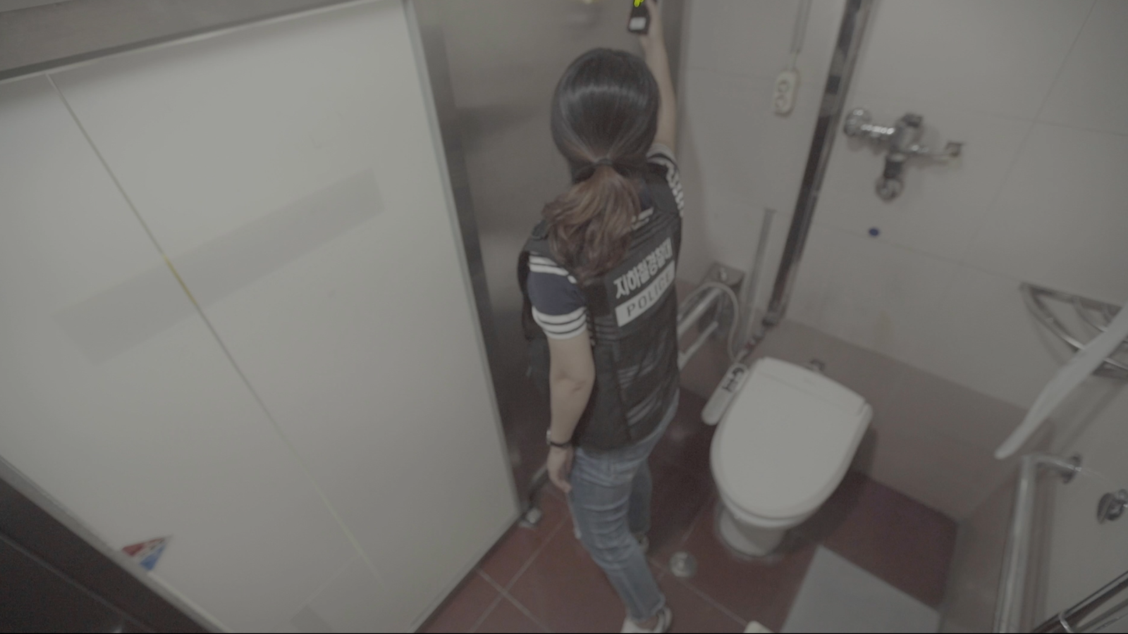 Hidden camera in public bathroom