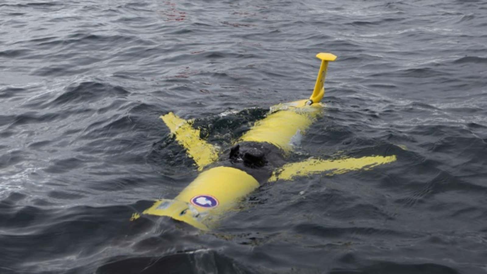 A Rutgers/Webb-Slocum glider being released by scientists near Antarctica