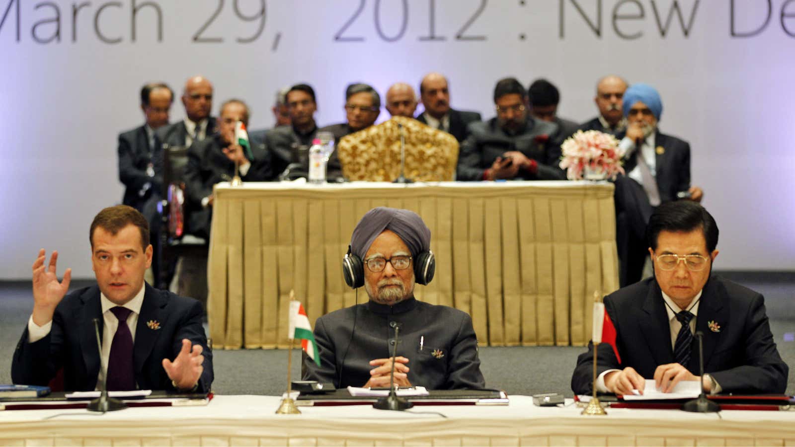 Leaders of states, from left to right, Russian President Dmitry Medvedev, Indian Prime Minister Manmohan Singh and Chinese President Hu Jintao attend the BRICS 2012 Summit in New Delhi, India.