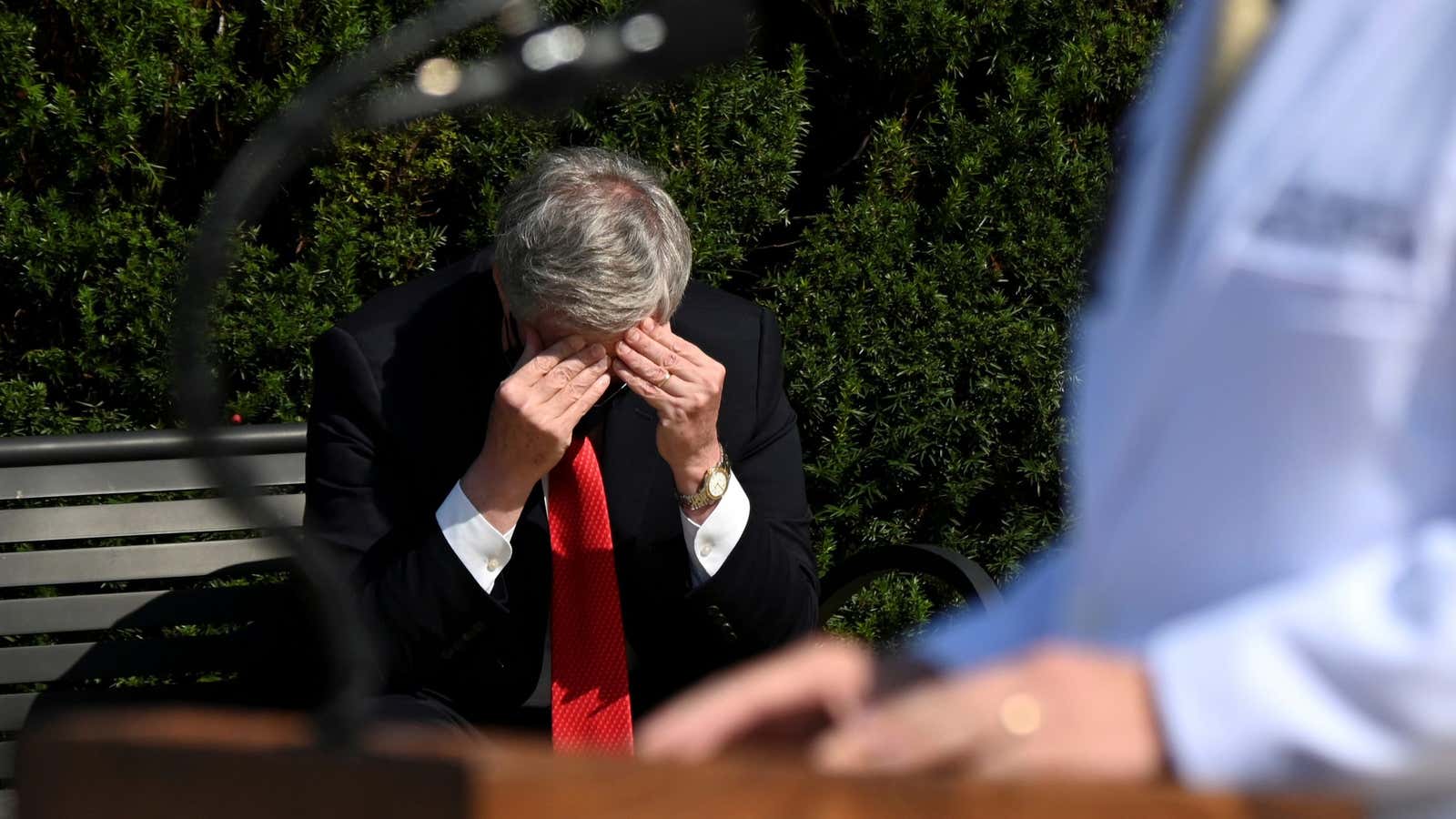 White House Chief of Staff Mark Meadows rubs his head as U.S. Navy Commander Dr. Sean Conley, the White House physician, speaks to the media…