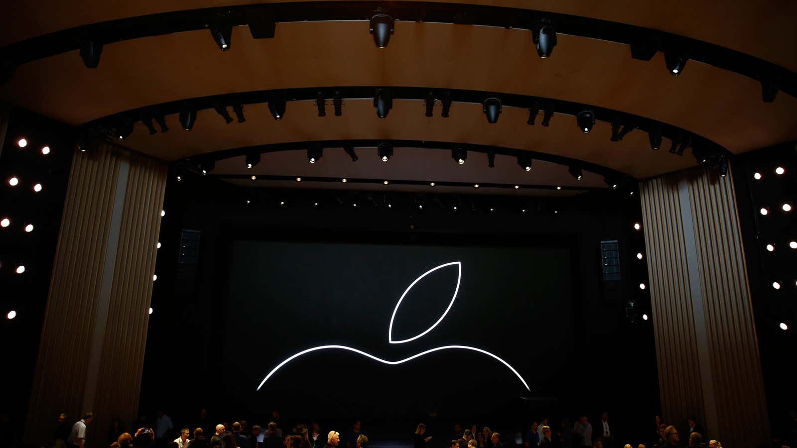 Attendees wait for the start of an Apple Inc product launch event at the Steve Jobs Theater in Cupertino, California, U.S., September 12, 2018. REUTERS/Stephen…