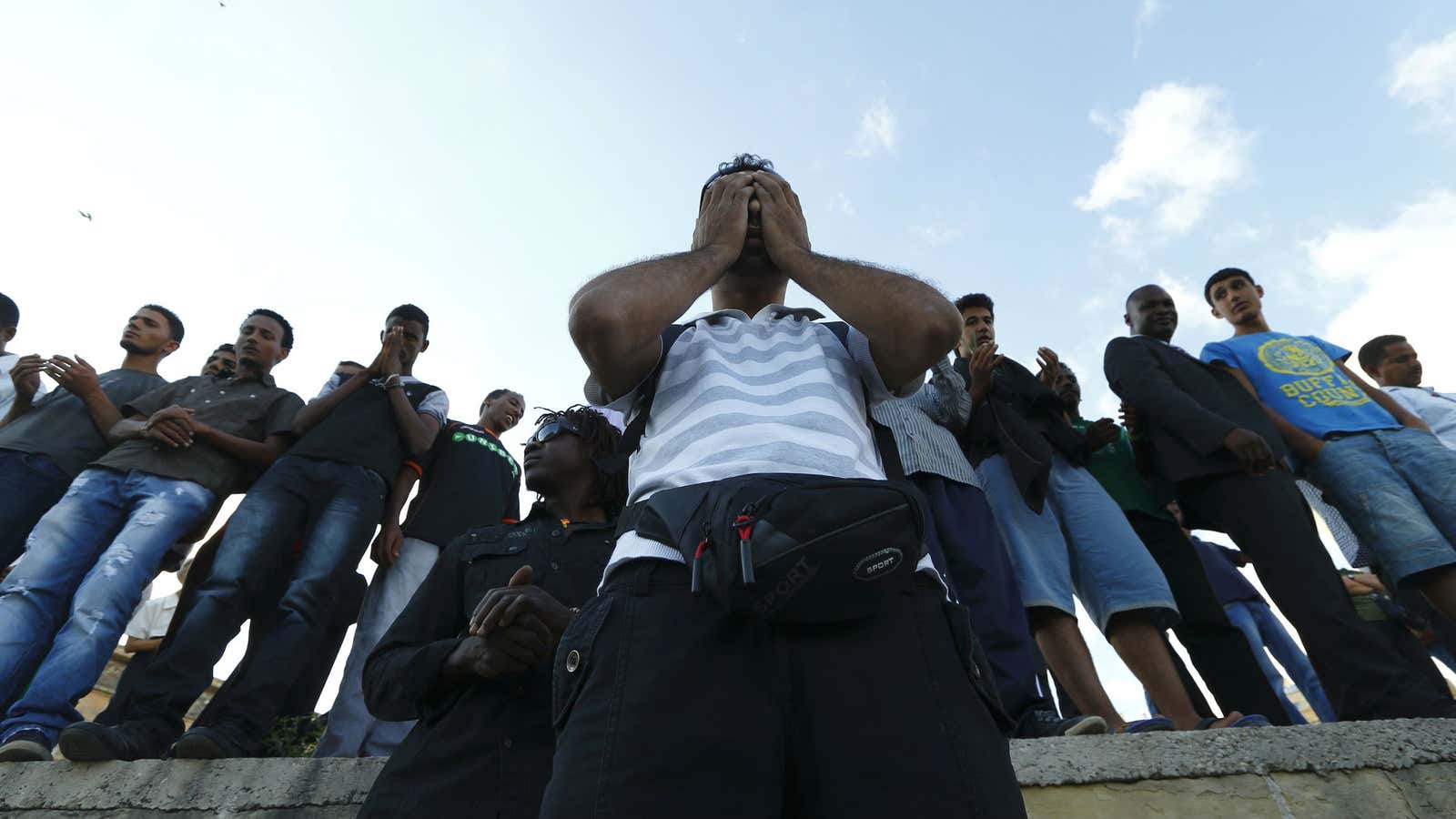 Migrants from Syrian and Sub-Saharan Africa attend a commemorative service in Malta for those who lost their lives at sea while attempting to reach Europe.