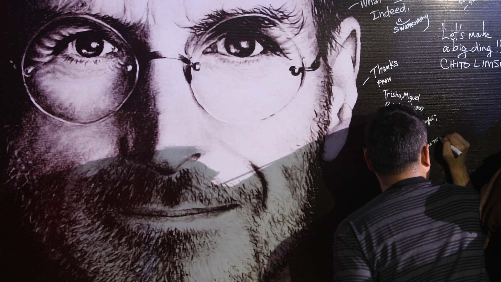 A billboard set up for ‘Steve Jobs Day ‘ in Manila October 14, 2011.