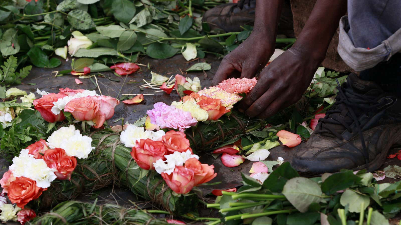 Flowers in the shape of a cross for sale outside the City Mortuary in Nairobi.