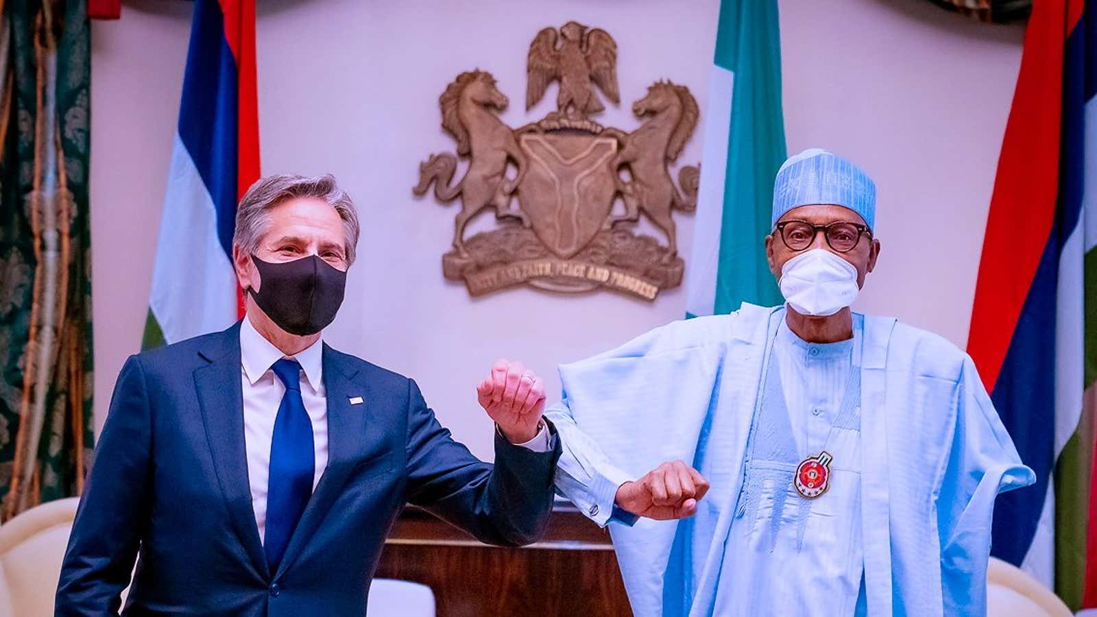 Blinken and Buhari share an elbow bump