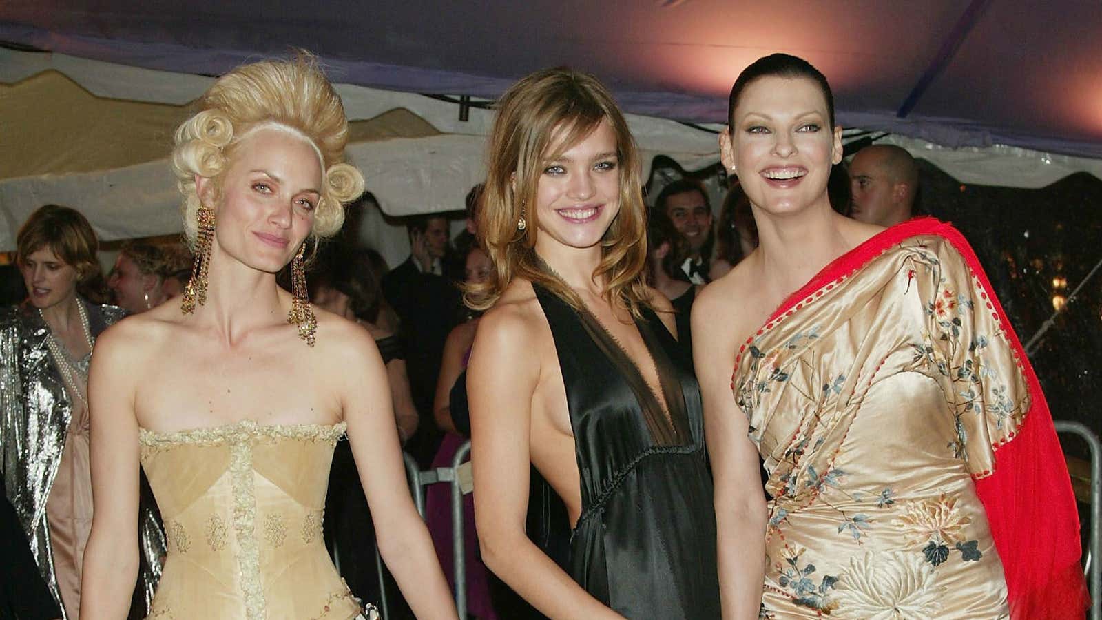 Amber Valetta, Natalia Vodianova and Linda Evangelista dressed for the “Dangerous Liaisons” Met Gala in 2004.