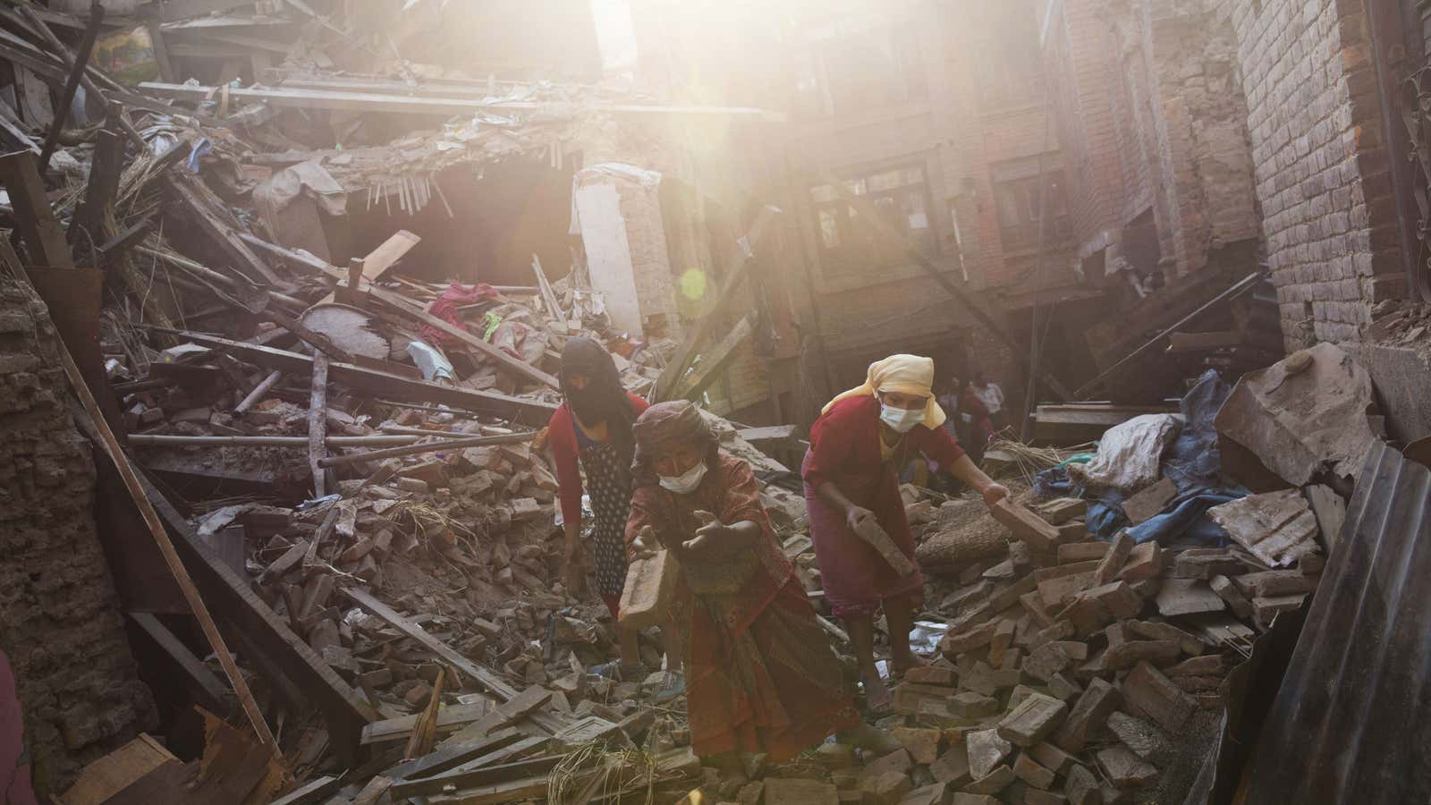 Women searching for their belongings in Bhaktapur, Nepal.