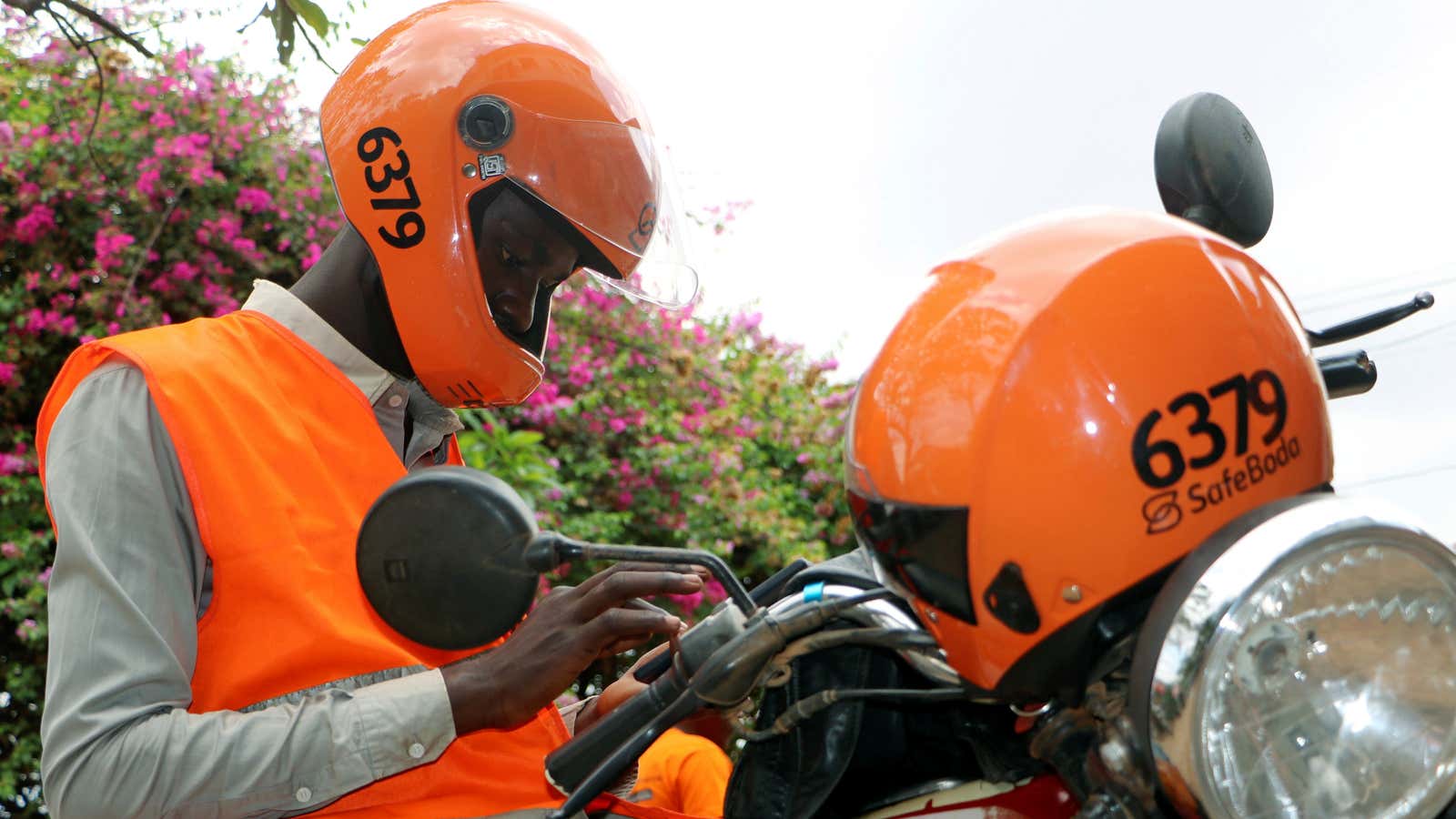 A motorcycle taxi driver known as boda-boda, from SafeBoda in Uganda. Innovation has been built on the back of the mobile industry