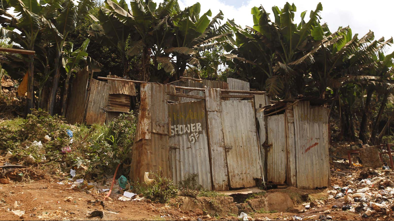 A public toilet made of rusty sheets of metal