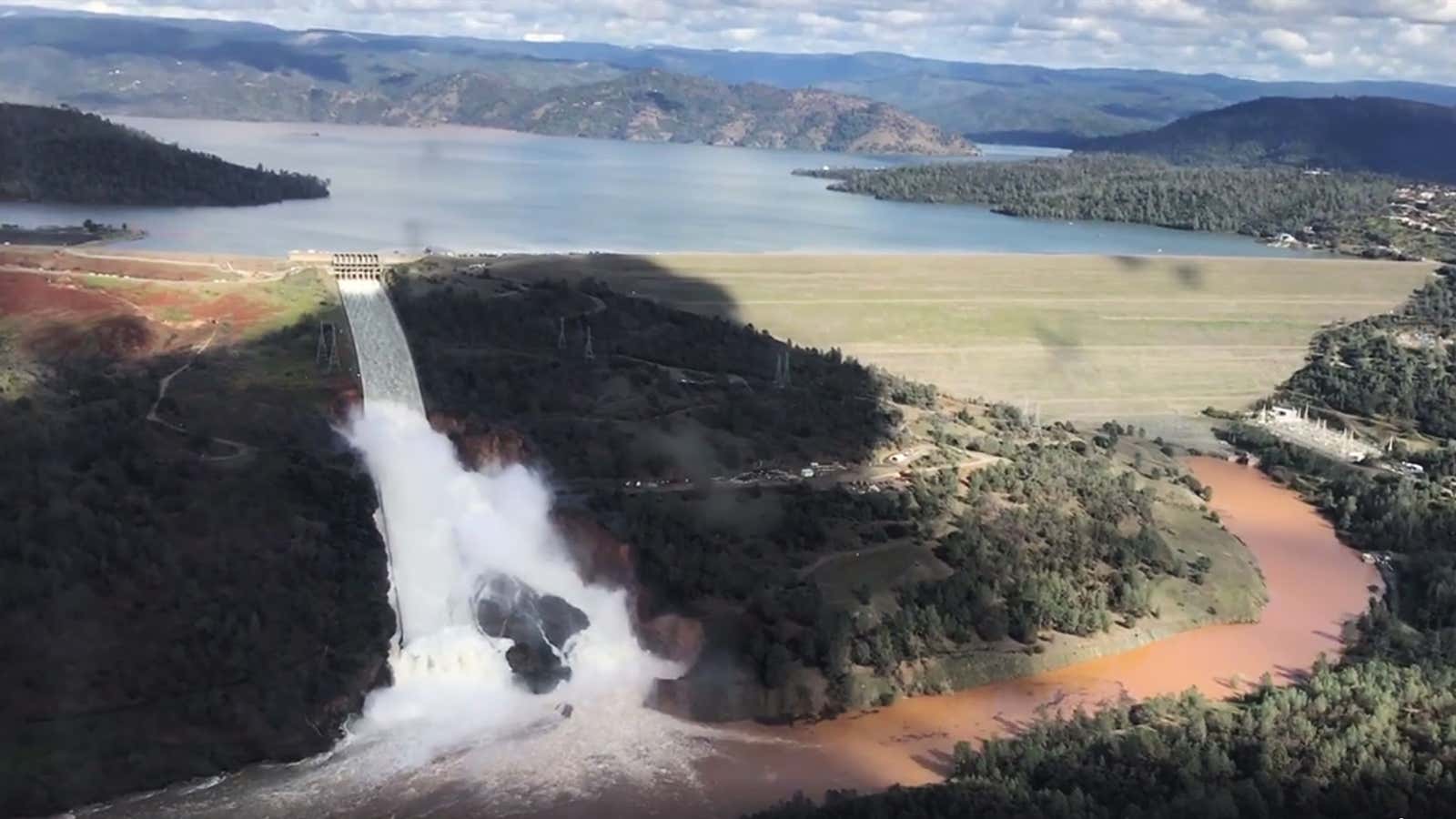 Water gushed over the Oroville Dam emergency spillway. Environmental groups saw this coming