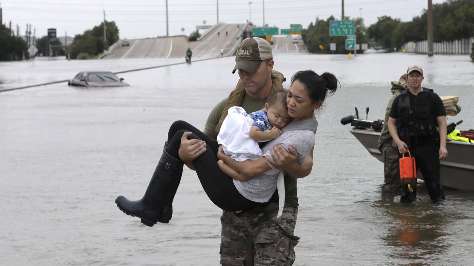 Iconic images of rescuers and good Samaritans spotlight the heroes of Harvey