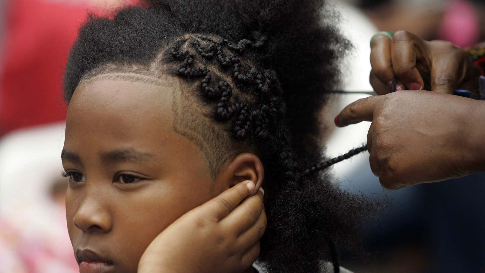 Embracing black hair goes against school policy.