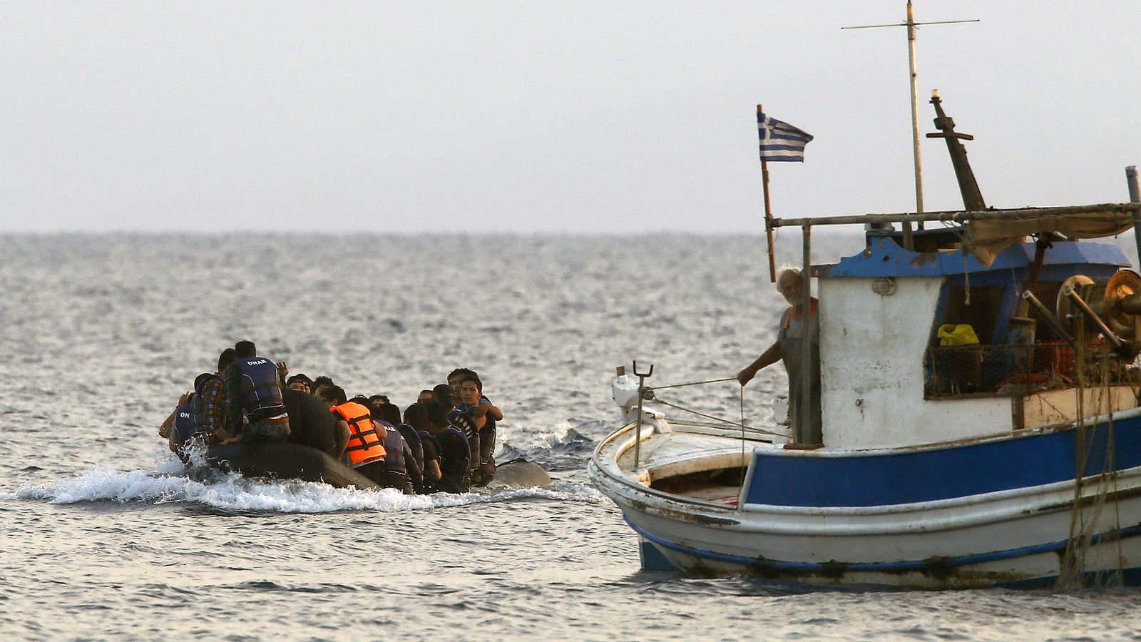 Afghan refugees approach the Greek island of Kos.