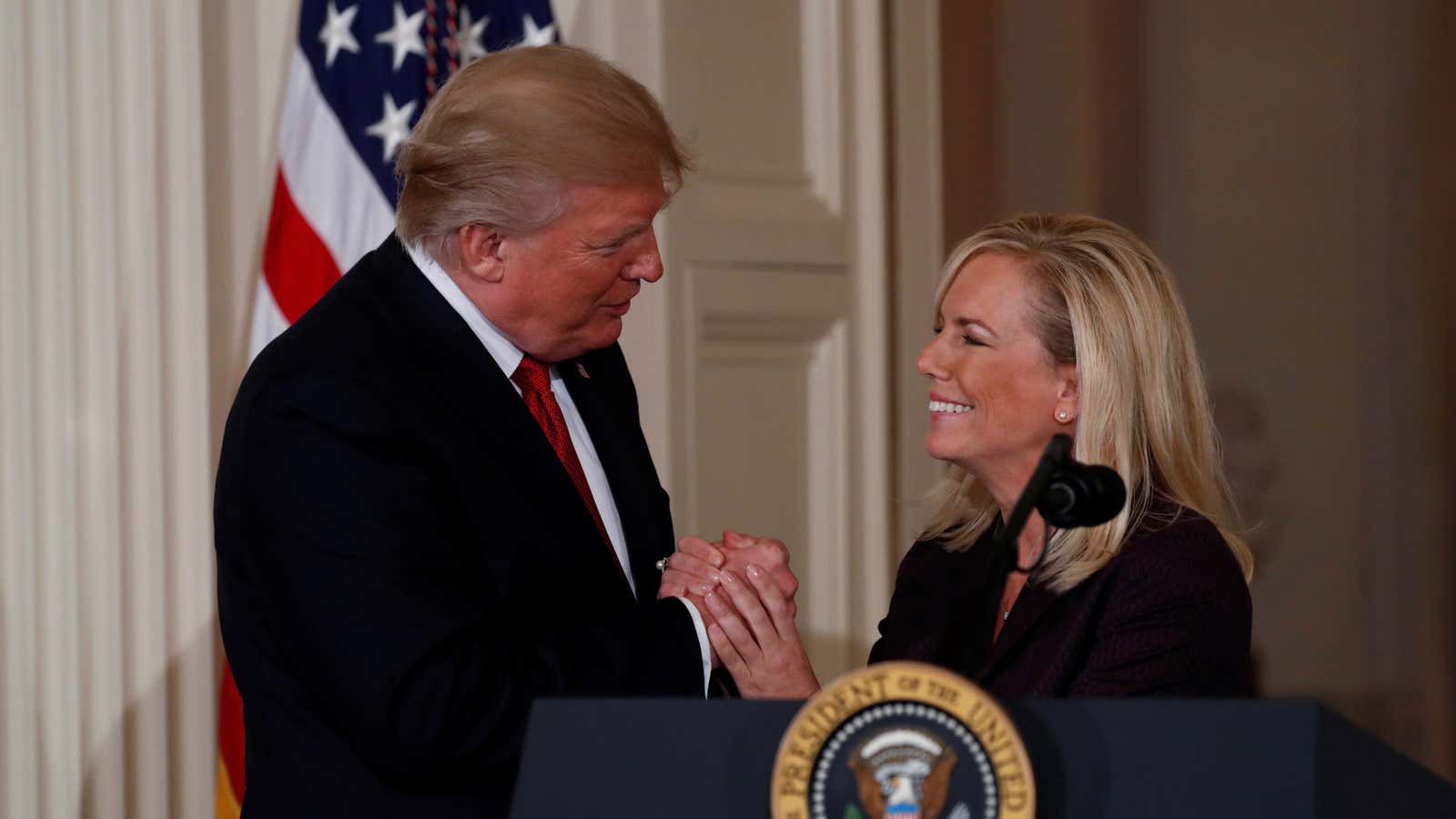 Donald Trump and Kirstjen Nielsen before she began her brief tenure at DHS.