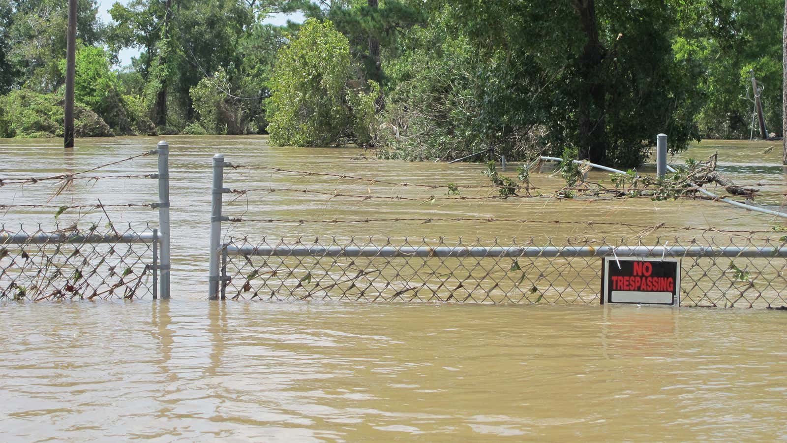 Highlands Acid Pit Superfund site in Texas. Normally, its toxic waste is cordoned off.