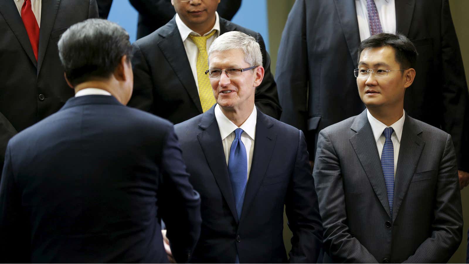 Tim Cook with Tencent founder Pony Ma, right and Xi Jinping, left.