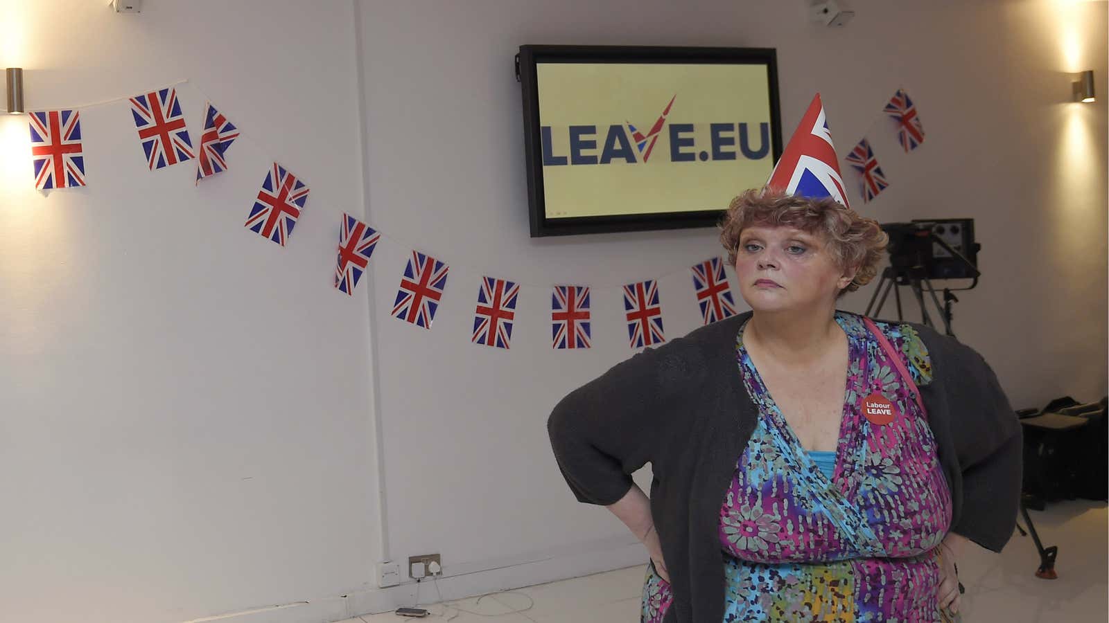 A Leave.eu supporter wears a union flag paper hat during the Brexit vote in 2016.