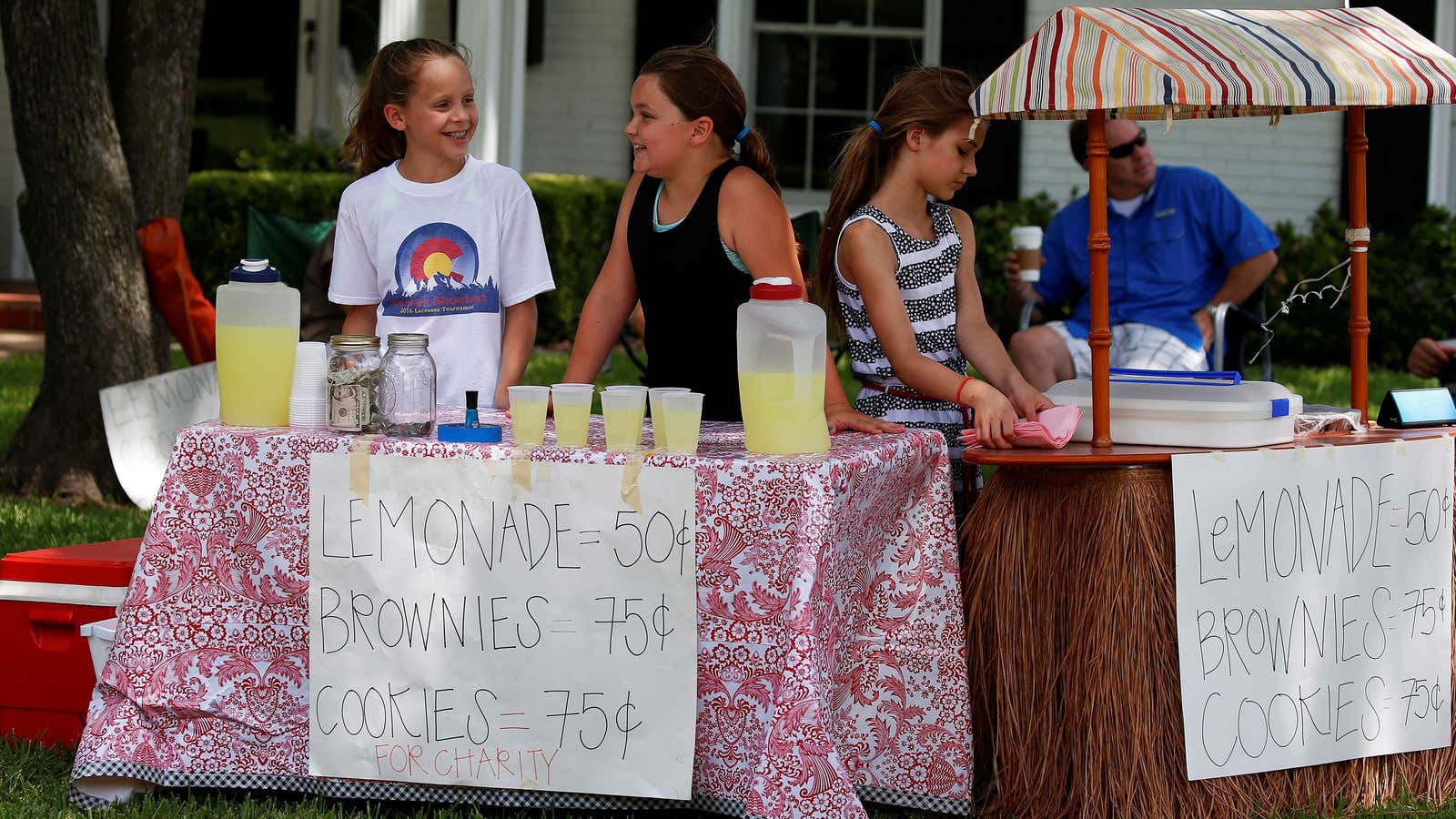 Children operate a charity lemonade stand to raise funds for the Dallas Police Department following the multiple police shootings in Dallas, Texas, U.S., July 9,…