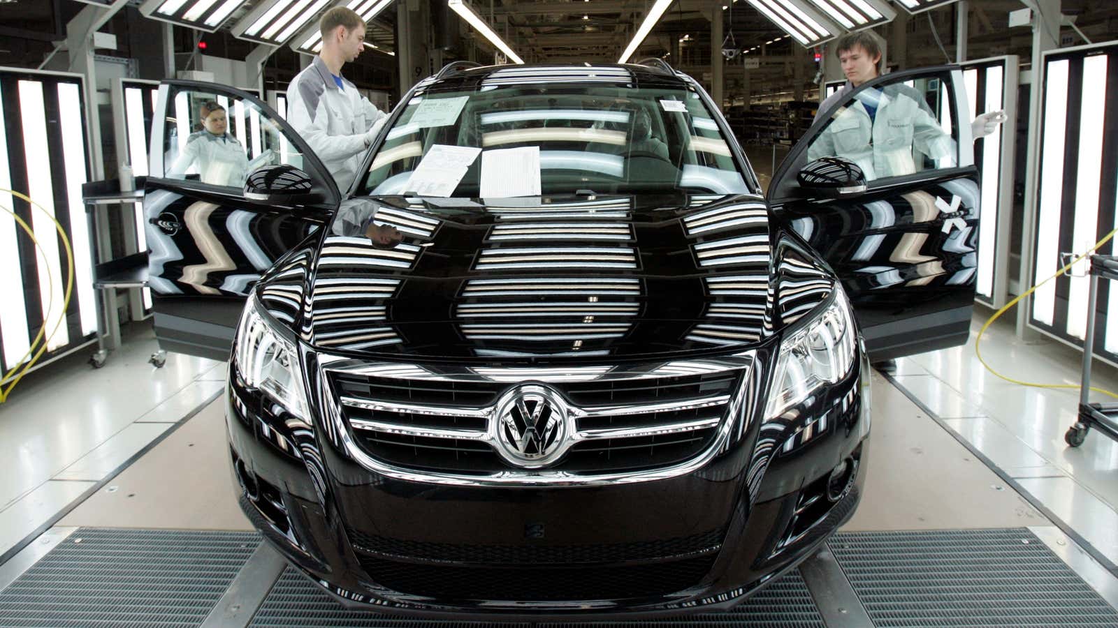 DATE IMPORTED:October 20, 2009Employees at a Volkswagen factory work on an assembly line in the city of Kaluga, Russia.