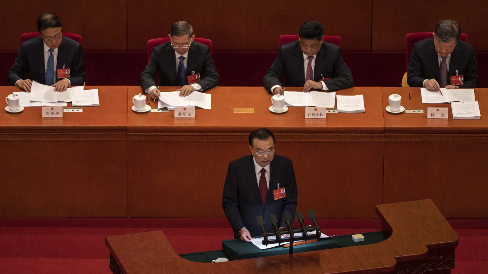 Chinese Premier Li Keqiang speaks at the opening session of the National Peoples Congress at the Great Hall of the People.