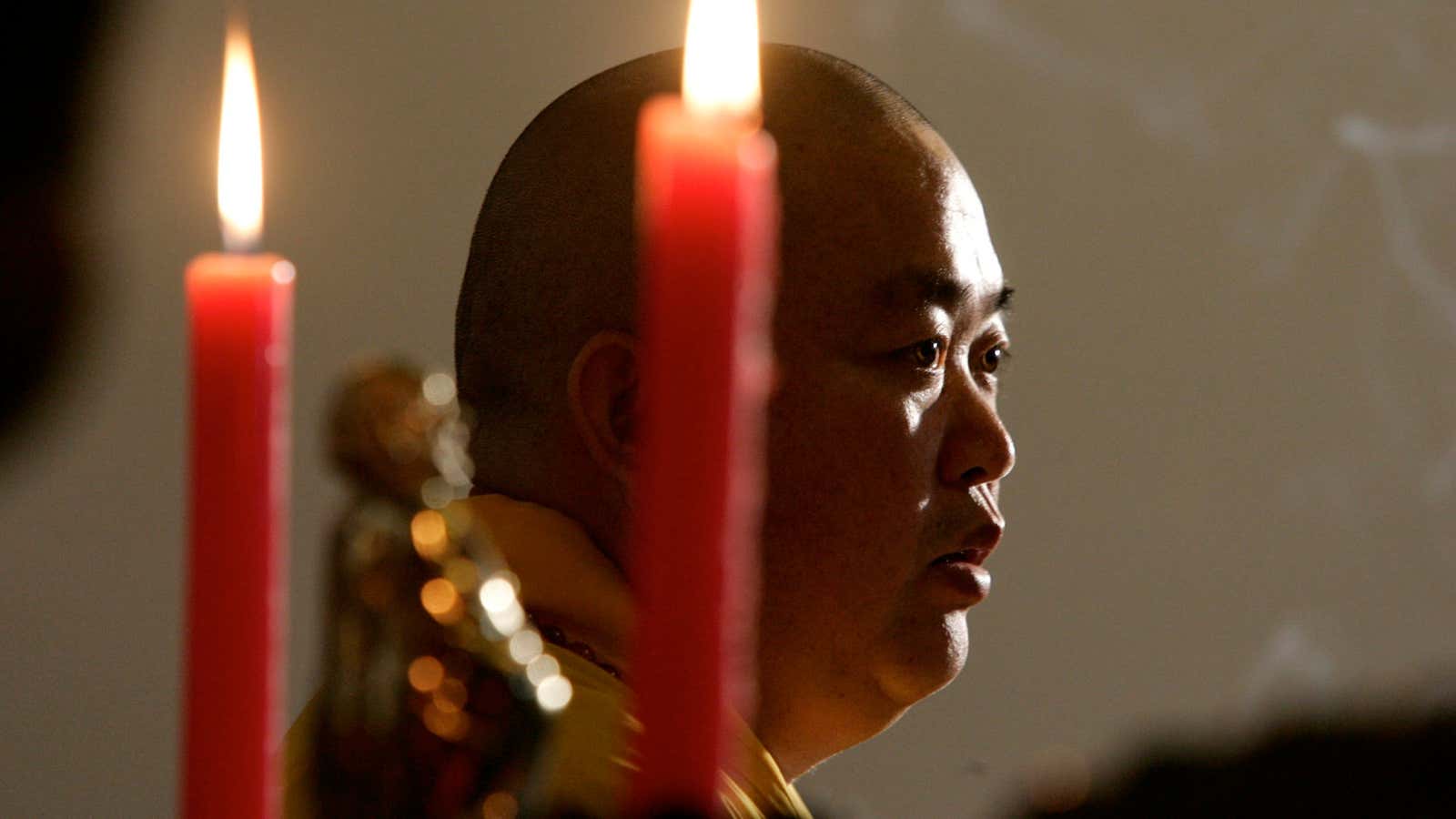 Buddhist abbot Shi Yongxin talks to reporters at Shaolin Temple.