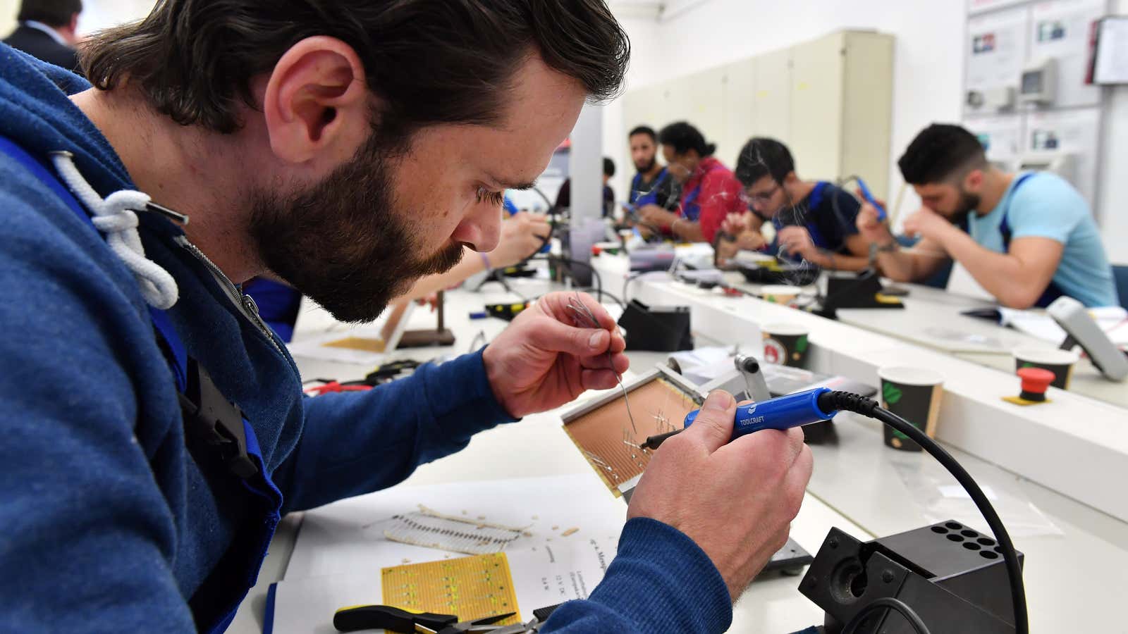 A Syrian refugee at a German Railway training workshop.