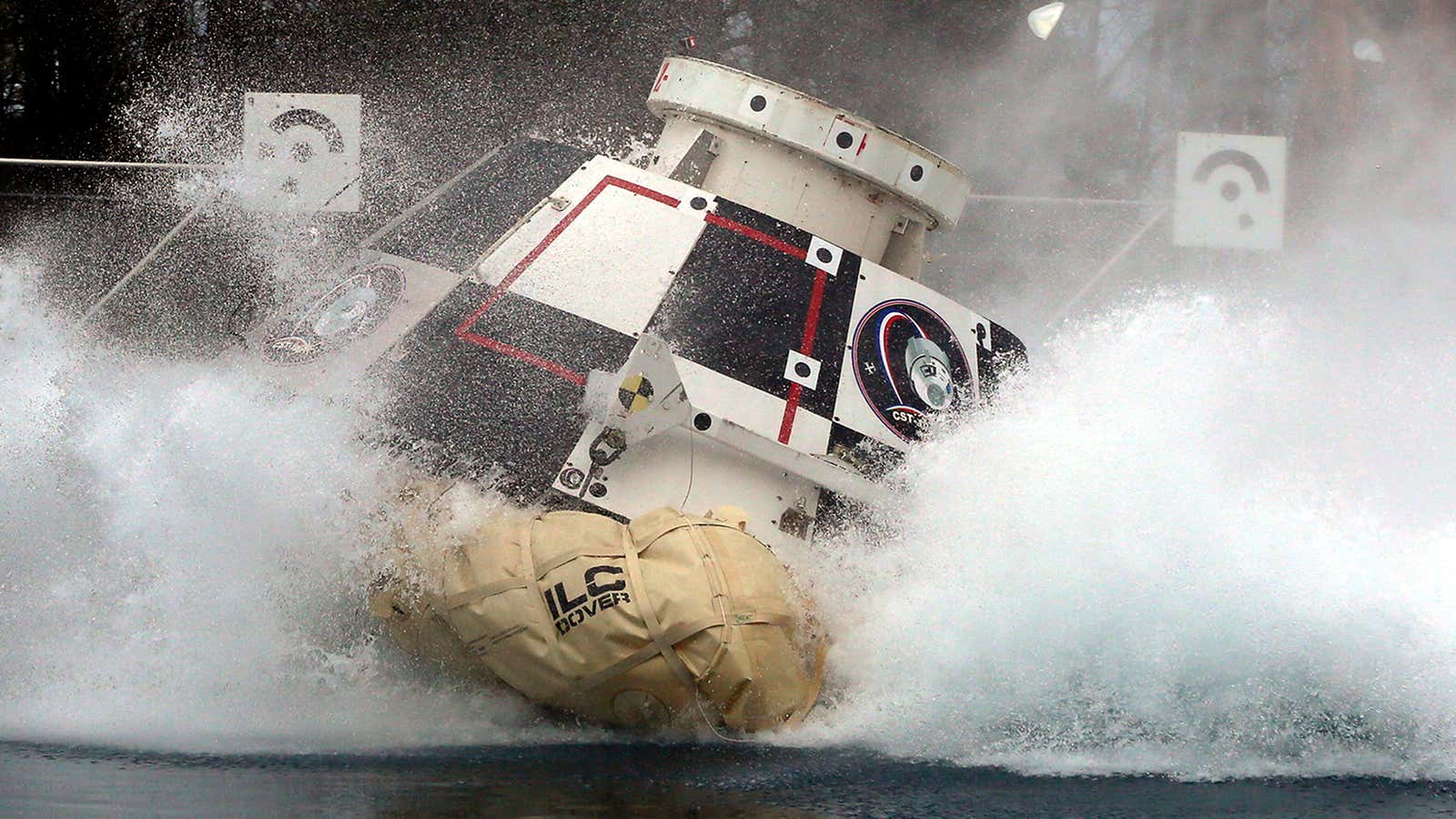 A mock-up of Boeing’s CST-100 Starliner splashes down in 2016.