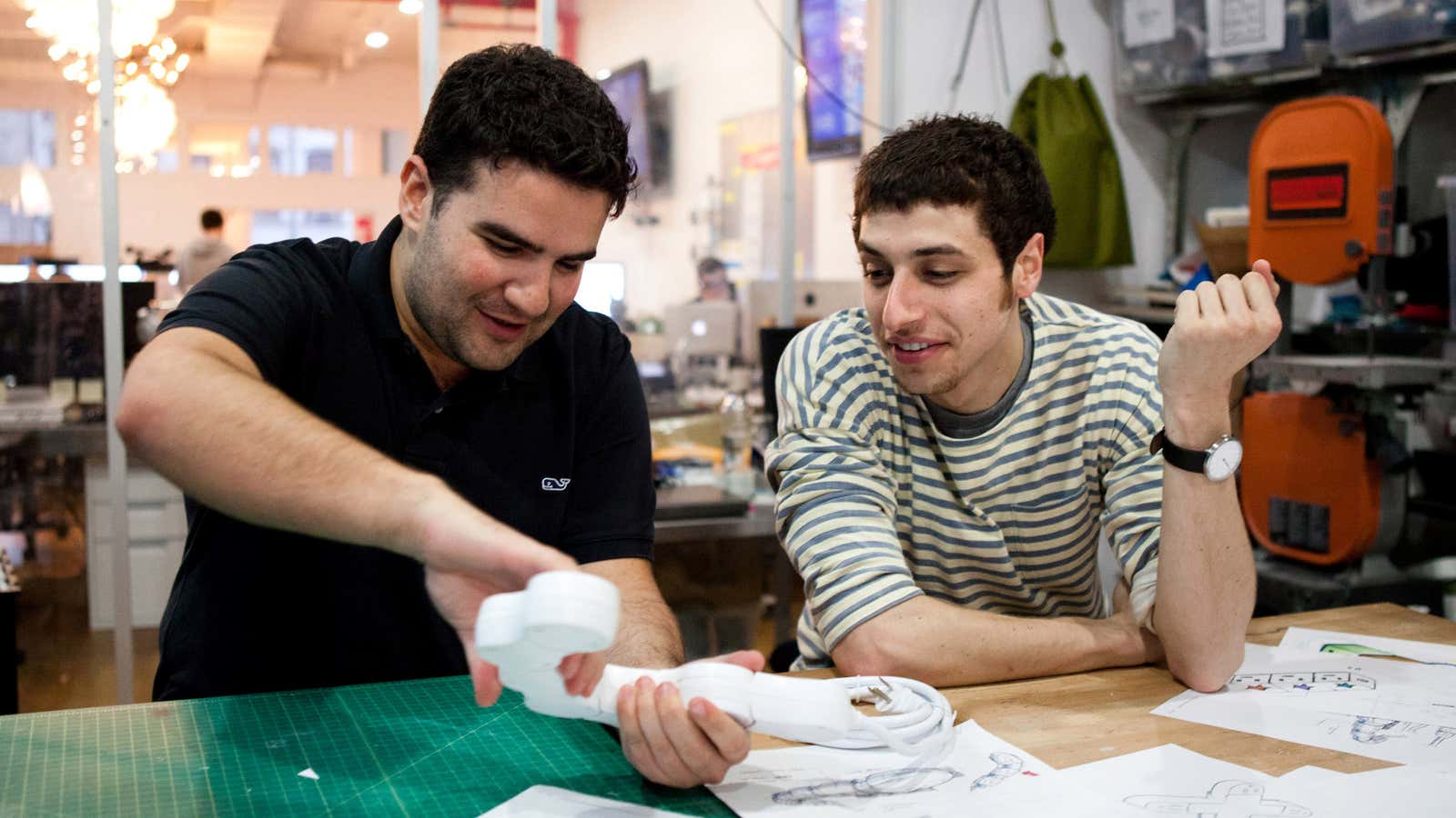 Quirky CEO Ben Kaufman and inventor Jake Zien work on a prototype.