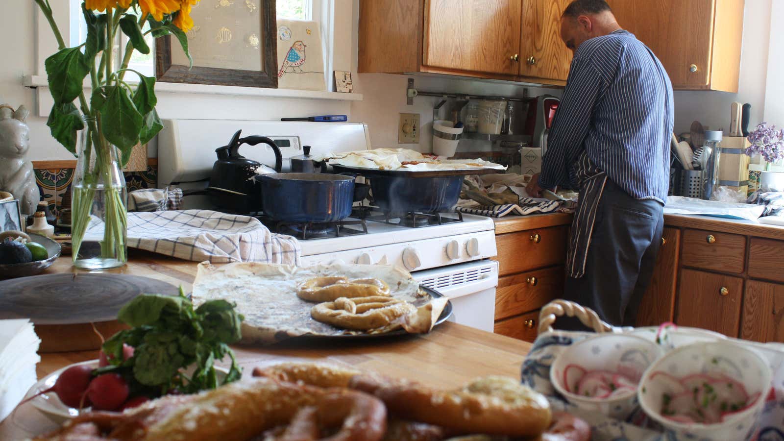 A home cook prepares a meal to sell on the Josephine marketplace.