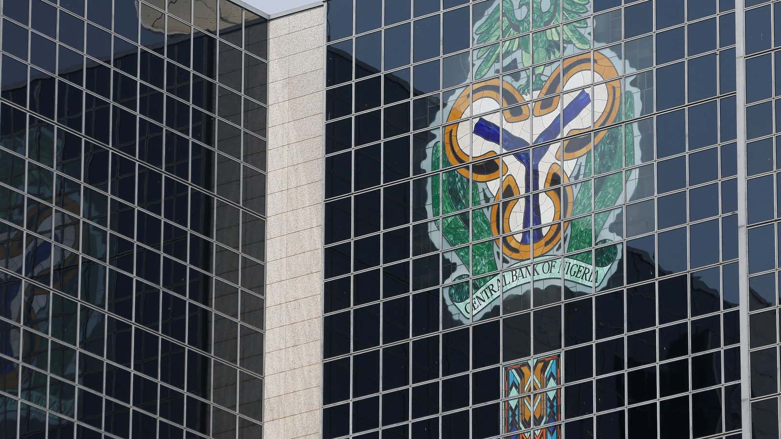 Central Bank of Nigeria’s logo is seen on the headquarters building in Abuja, Nigeria