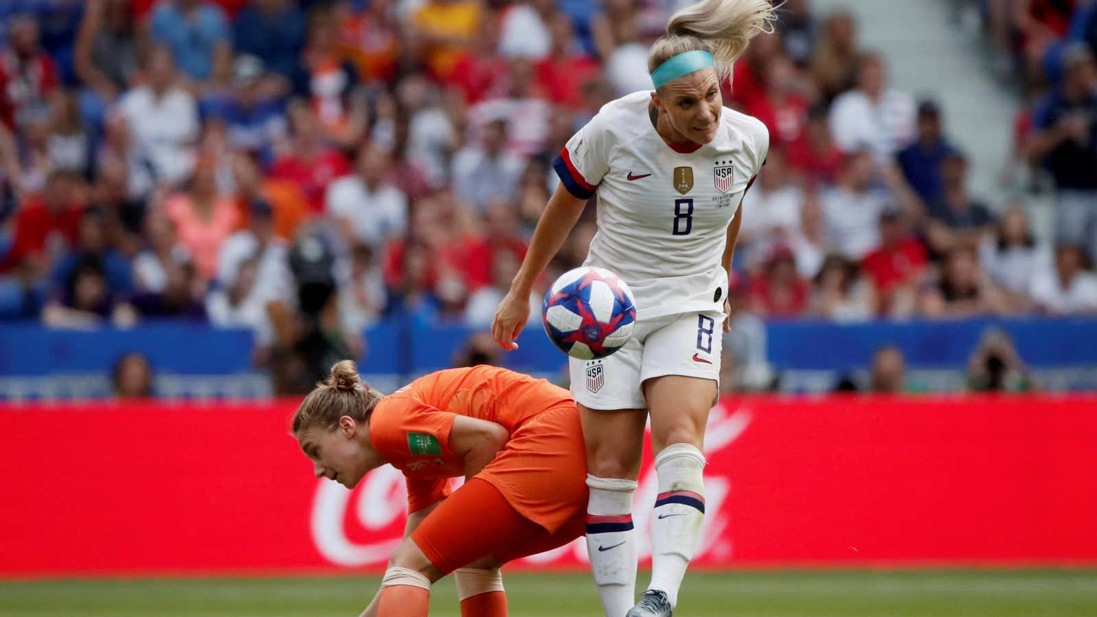 Julie Ertz of the US with Netherlands’ Vivianne Miedema.