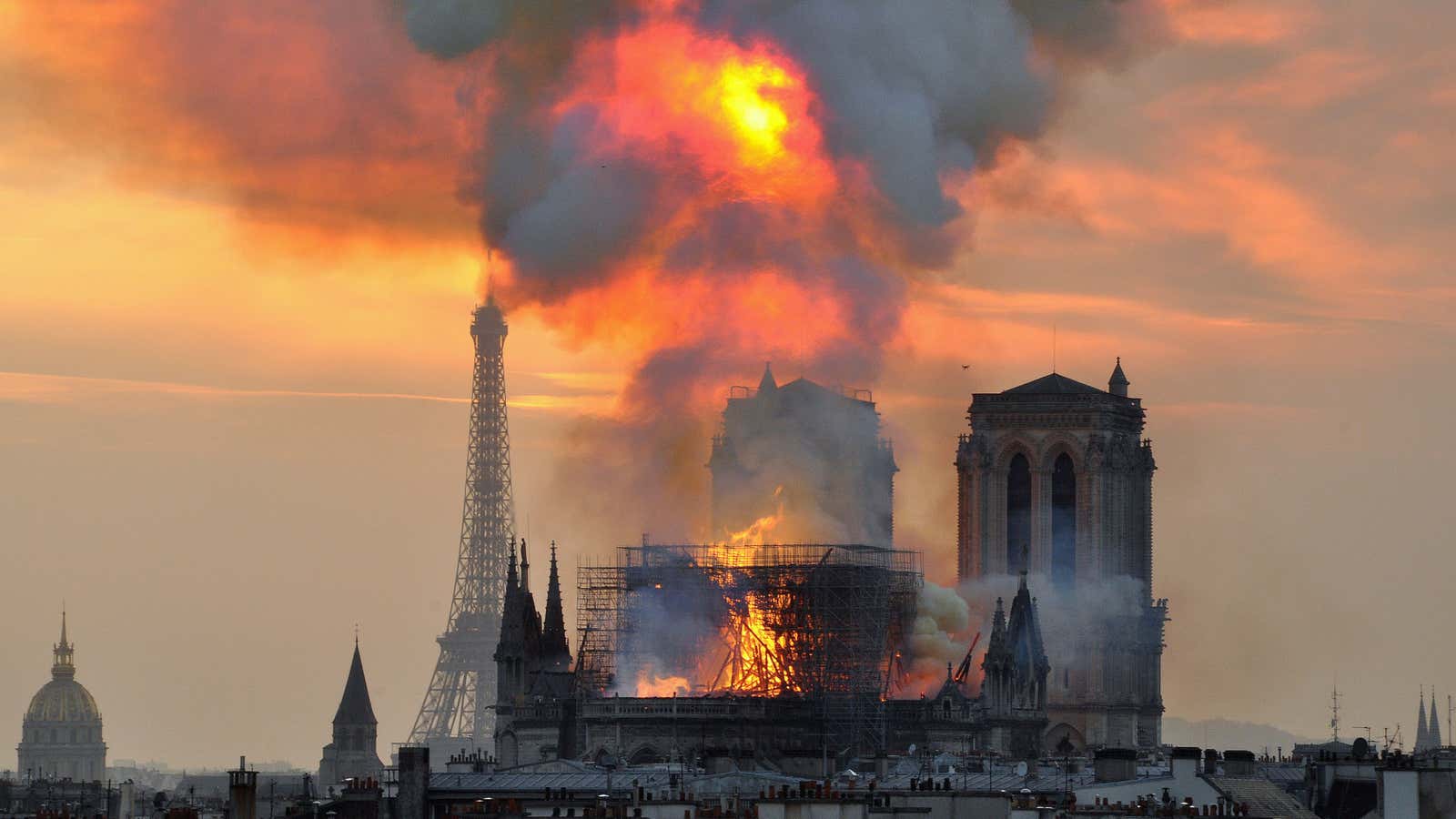 Flames and smoke rise from the blaze at Notre Dame cathedral in Paris, Monday, April 15.